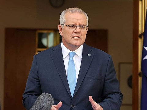Australia's Prime Minister Scott Morrison attends a press conference at Parliament House in Canberra on April 10, 2022.