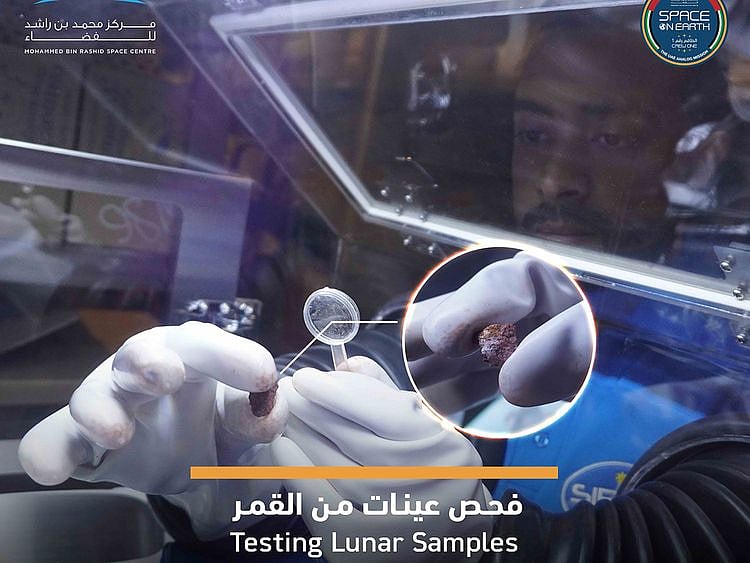 UAE analog astronaut Saleh AlAmeri testing samples that he collected with his colleagues while performing a lunar landing simulation
