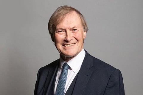An undated handout photograph released by the UK Parliament shows Conservative MP for Southend West, David Amess, posing for an official portrait photograph at the Houses of Parliament in London.  