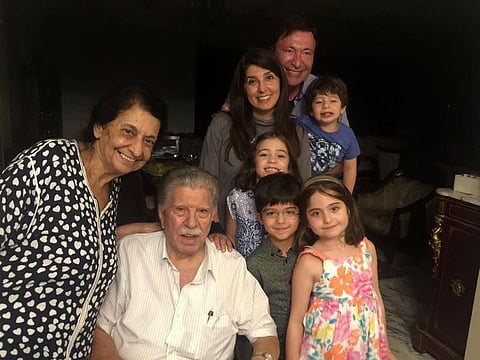 Dr Al Shunnar (in white shirt) with his wife Dr Zainab Kazim, his grandchildren, daughter Dr Amal and son-in-law Dr Michael Fakih.