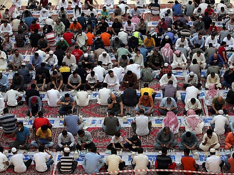 Muslims eat their Iftar meal at a Al Rajhi Mosque, in Riyadh, Saudi Arabia, on April 5, 2022.  