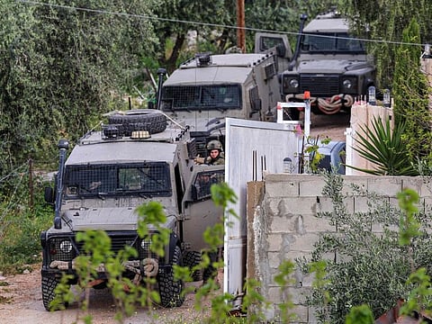 Israeli soldiers take part in a military operation in Jenin in West Bank on April 12, 2022.  
