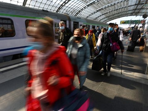 Refugees from Ukraine walk on a platform after they left a train from Warsaw, Poland, at Berlin's Hauptbahnhof central station, amid Russia's attack on Ukraine, in Berlin, Germany March 29, 2022.