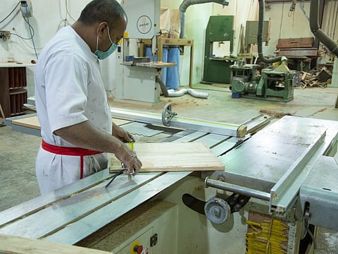 Inmates at work at the craft centre inside Dubai Central Jail.