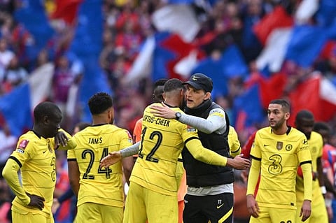 Chelsea's German head coach Thomas Tuchel (right) congratulates midfielder Ruben Loftus-Cheek (left) at the end of the English FA Cup semi-final against Crystal Palace at Wembley Stadium in north west London.