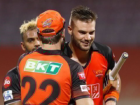 Sunrisers Hyderabad captain Kane Williamson congratulates Nicholas Pooran (left) and Aidan Markram after the win over the Punjab Kings in the Tata Indian Premier League 2022 game at the DY Patil Stadium in Mumbai on April 17, 2022. 