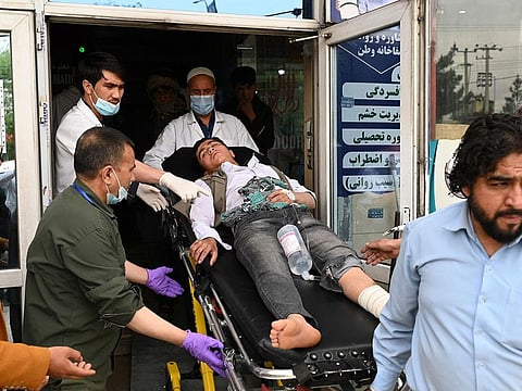  An injured being moved to hospital after Tuesday's blasts.