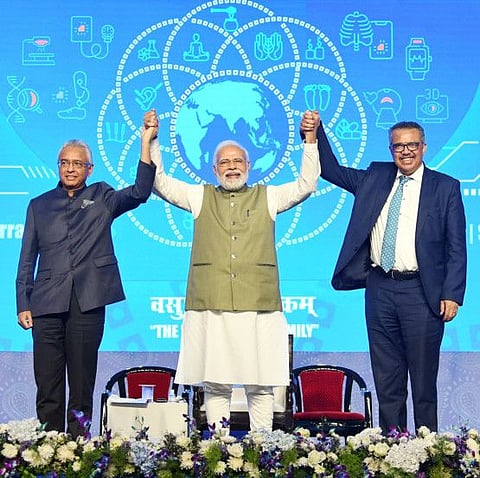 Prime Minister Narendra Modi, World Health Organization (WHO) Director-General Dr Tedros Ghebreyesus, and Mauritius Prime Minister Pravind Kumar Jugnauth join hands at the foundation stone laying ceremony of WHO Global Centre for Traditional Medicine (GCTM), in Jamnagar on April 19,2022..  