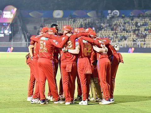 Punjab Kings team huddles before entering the field during Match 32 of the TATA Indian Premier League 2022 against Delhi Capitals at Brabourne Stadium on Wednesday. 