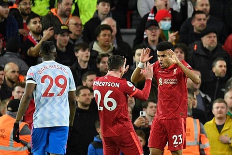 Liverpool's Luis Diaz celebrates after scoring his team first goal during the English Premier League match against Manchester United at Anfield in Liverpool on Tuesday.