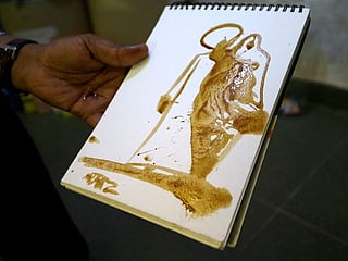 Natural artist: Sudan painter uses tea and coffee to make colours