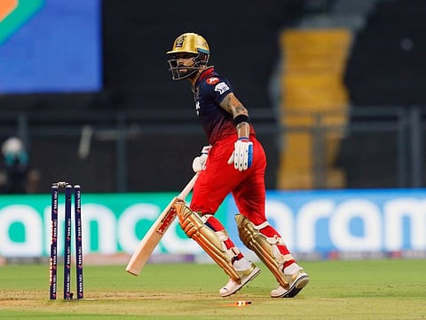 Royal Challengers Bangalore's Virat Kohli gets run out during the IPL 2022 match against Delhi Capitals at  Wankhede Stadium.
