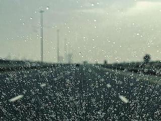 Photos: Rain in Dubai, Sharjah, dusty skies in some parts of the UAE