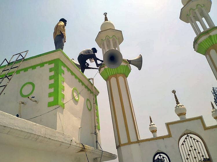 Loudspeakers are being taken down from religious places, in Gorakhpur on Wednesday. 