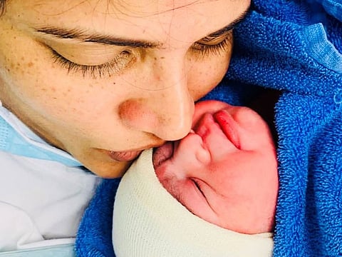 Divya Karthik with baby number two, Thanvit Karthik. 