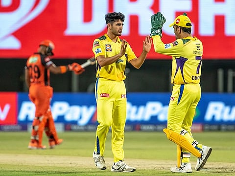 Chennai Super Kings' Mukesh Choudhary and skipper Mahendra Singh Dhoni celebrate a dismissal during last year's IPL. The left-arm pacer has been ruled out this season.