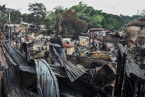 A general view shows the aftermath of a fire at an informal settlement inside the campus of the University of the Philippines in Quezon City, suburban Manila on May 2, 2022.