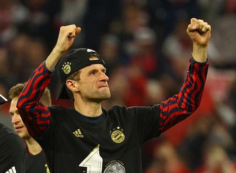 Bayern Munich's Thomas Muller celebrates after winning the Bundesliga at Allianz Arena last month.