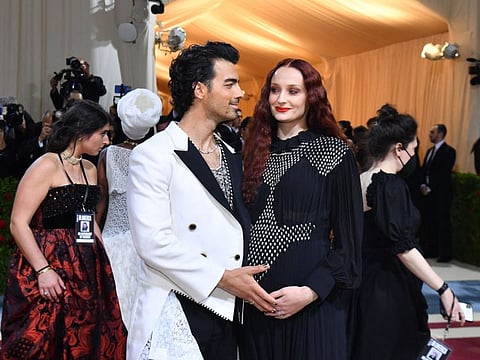 US musician-actor Joe Jonas and wife English actress Sophie Turner arrive for the 2022 Met Gala at the Metropolitan Museum of Art on May 2, 2022, in New York.