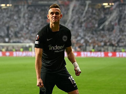 Rafael Borre celebrates scoring for Frankfurt against West Ham.