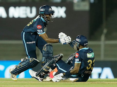 B. Sai Sudharsan and Hardik Pandya of Gujarat Titans during match 51 of the TATA Indian Premier League 2022 (IPL season 15) against Mumbai Indians at the Brabourne Stadium (CCI) in Mumbai.