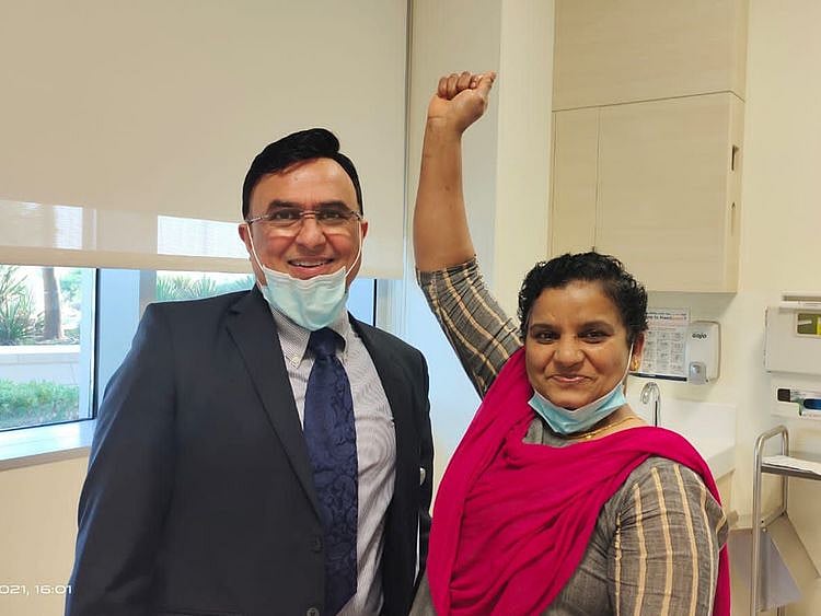 Dr Ravi Kumar Trehan with patient Bindumol 