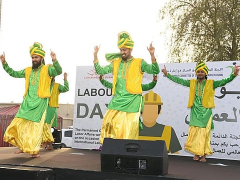 Dance performance by workers during the Labour Day celebrations in Dubai on Saturday.