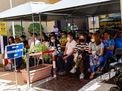 Overseas voter wait for their turn to cast their vote for Philippine general election at Dubai consulate. 