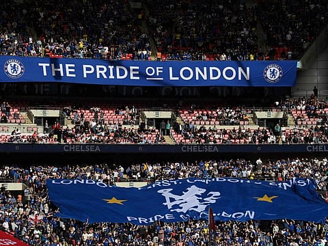 Chelsea supporters display a large flag as they build the atmosphere ahead of the English FA Cup semi-final against Crystal Palace at Wembley Stadium on Friday.