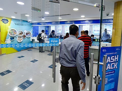 Customers at Lulu Exchange in Sharjah. 