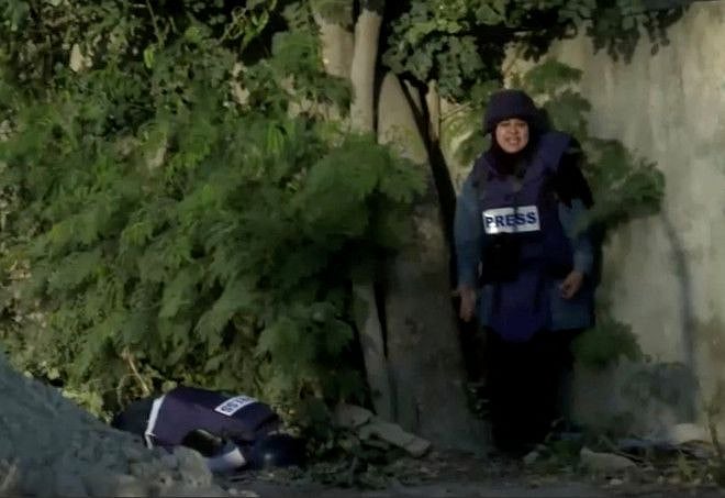 Copy of 2022-05-11T103748Z_696454837_RC2Y4U9QOJ69_RTRMADP_3_PALESTINIANS-ISRAEL-BODY-SITE-1652266824216