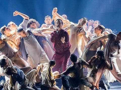 Diodato, centre, performs during the first semi final at the Eurovision Song Contest in Turin, Italy, Tuesday, May 10, 2022