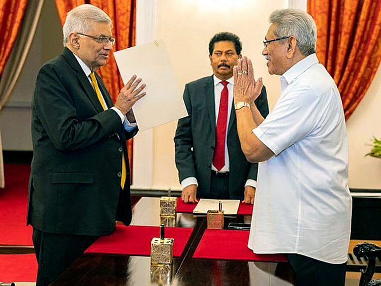 President Gotabaya Rajapaksa (right) with Ranil Wickremesinghe after the latter took the oath of office as the new prime minister in Colombo, on May 12, 2022. 