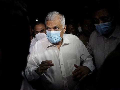 Ranil Wickremesinghe, newly appointed prime minister, arrives at a Buddhist temple after getting sworn-in by President Gotabaya Rajapaksa, amid the country's economic crisis, in Colombo, Sri Lanka, May 12, 2022. 