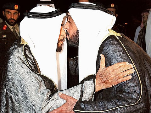 Sheikh Khalifa welcomes Sheikh Zayed, who returned from Geneva after a private visit.