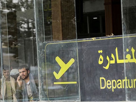 People at the departures lounge at Sana'a airport in Yemen on April 24, 2022.  