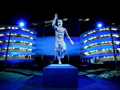 The large-scale galvanised steel sculpture of Sergio Aguero joins statues of Vincent Kompany and David Silva on the East Side of the Etihad Stadium.