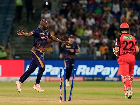 Kolkata Knight Riders' Andre Russell celebrates the dismissal of Sunrisers Hyderabad skipper Kane Williamson during their TATA Indian Premier League 2022 match at MCA Stadium in Pune on Saturday.