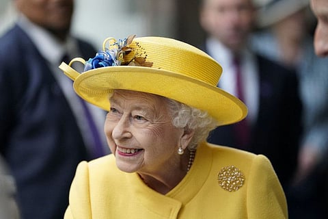 Britain's Queen Elizabeth meets staff of the Crossrail project and Elizabeth Line as they mark the completion of London's Crossrail project at Paddington station in London on May 17, 2022.  