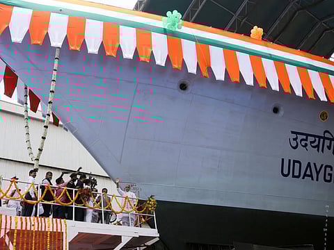Indian Defence Minister Rajnath Singh waves before the launch of the second advanced stealth frigate warship under Project 17A named Udaygiri at Mazagon Dock Shipbuilders Limited (MDL), in Mumbai, on May 17, 2022.  