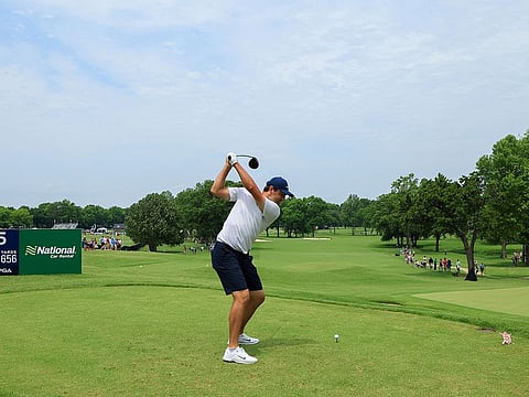 Scottie Scheffler of the United States, world No.1 and winner at the Masters last month, plays his shot from the fifth tee during a practice round prior to the start of the 2022 PGA Championship at Southern Hills Country Club  in Tulsa, Oklahoma.