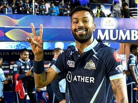 Captain Hardik Pandya celebrates Gujarat Titans’ win over the Royal Challengers Bangalore in the Tata Indian Premier League 2022 game at the Brabourne Stadium in Mumbai on April 30, 2022. Pandya’s leadership has played a major role in helping the Titans soar to the top of the points table. 
