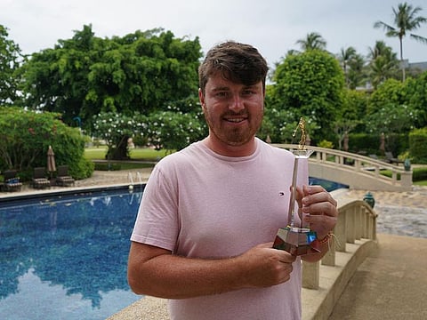 Winner of the MENA Tour's 2020+ Journey to Jordan Order of Merit, Tom Sloman (Eng), with his trophy.