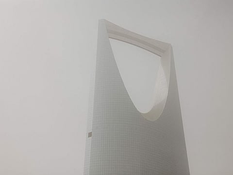 This picture taken on May 17, 2022 shows a view of the Kingdom Centre skyscraper in the centre of Saudi Arabia's capital Riyadh during a heavy dust storm. 
