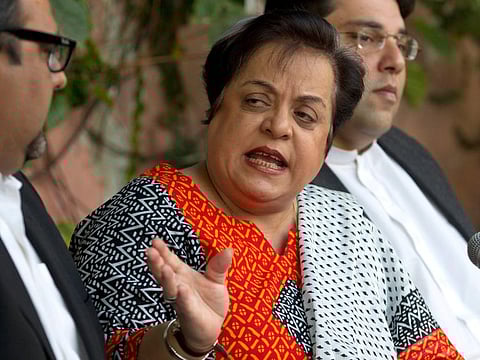 File picture shows Shireen Mazari, centre, leader of the Pakistan Tehreek-e-Insaf party.