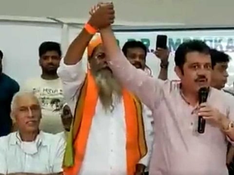 Karnataka Congress MLA B.Z. Zameer Ahmad Khan and Dalit leader Narayana Swamiji.