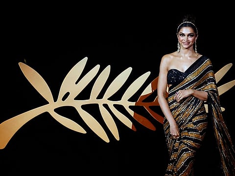 The 75th Cannes Film Festival - Opening ceremony and screening of the film "Coupez" (Final Cut) Out of competition - Cannes, France, May 17, 2022. Jury member Deepika Padukone arrives  on stage. 