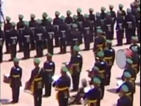  In the video, the guards of honour are seen sternly standing while one of them falls on the ground. They briefly turn attention to him before returning to their previous position.