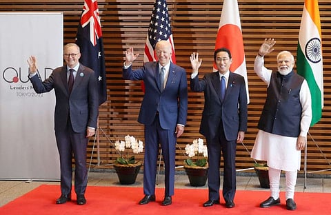 From left: Australian Prime Minister Anthony Albanese, US President Joe Biden, Japanese Prime Minister Fumio Kishida, and Indian Prime Minister Narendra Modi wave to the media prior to the Quad meeting at the Kishida's office in Tokyo on May 24, 2022. 