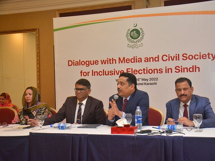 Officials of Election Commission of Pakistan speak at a dialogue with media and civil society representatives about local government polls in Sindh.